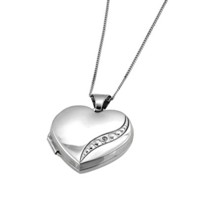 9ct White Gold Diamond Locket An ideal token of love, this stunning ...