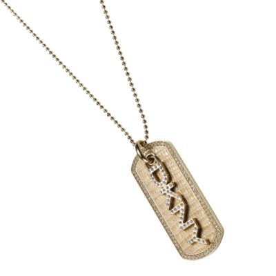 gold coloured dog tag