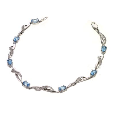 9ct white gold diamond and blue topaz bangle